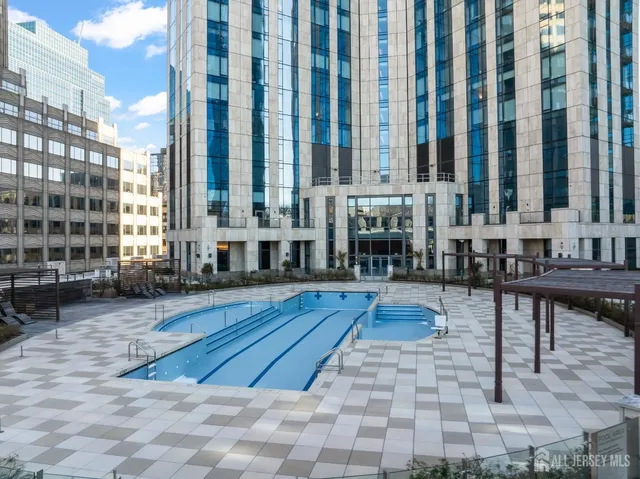 a view of balcony with wooden floor