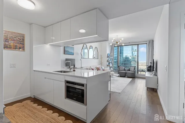 a room with furniture and a flat screen tv