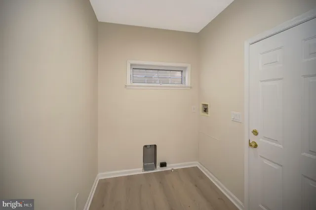 a view of small space with wooden floor