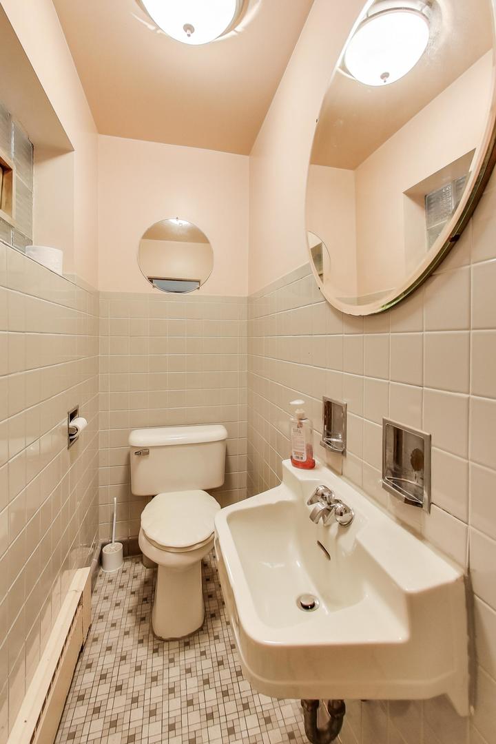 365 Lionel Road Riverside, IL 60546 - Photo 31 of 35 a bathroom with a sink and a mirror
