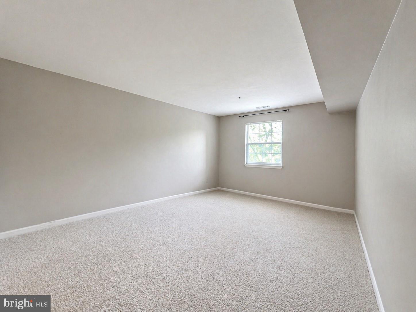 8353 Montgomery Run Road, Unit F Ellicott City, MD 21043 - Photo 13 of 25 a view of an empty room with window