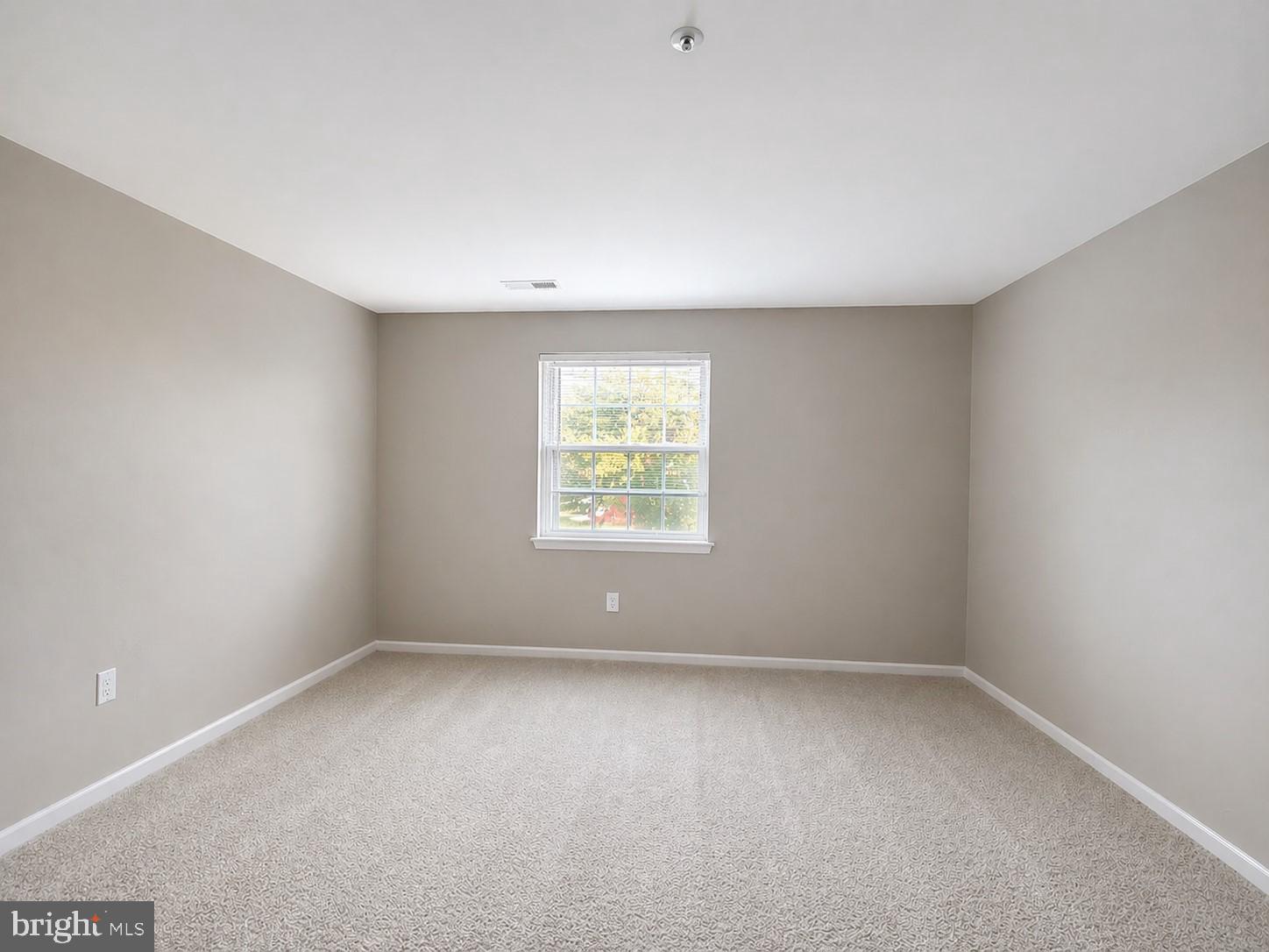 8353 Montgomery Run Road, Unit F Ellicott City, MD 21043 - Photo 18 of 25 an empty room with a window