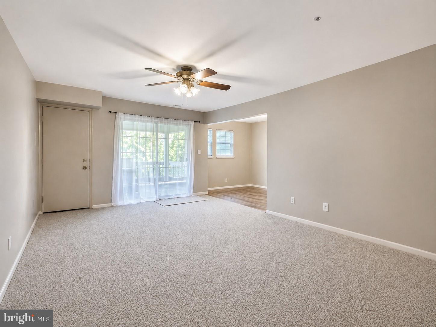 8353 Montgomery Run Road, Unit F Ellicott City, MD 21043 - Photo 5 of 25 a view of empty room with windows