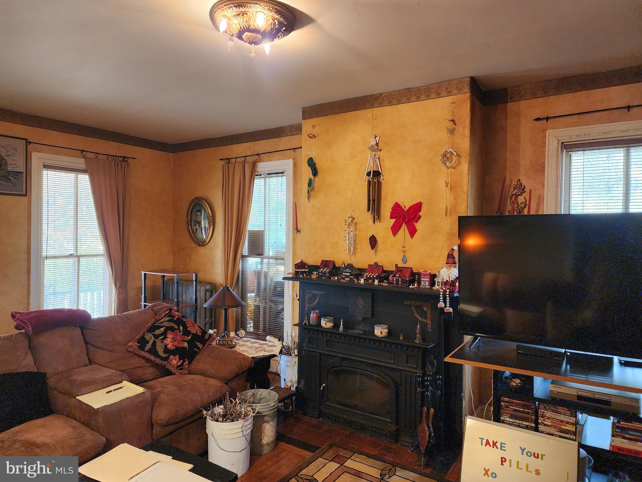 2307 Cooper Road Atco, NJ 08004 - Photo 11 of 47 a living room with furniture and a flat screen tv
