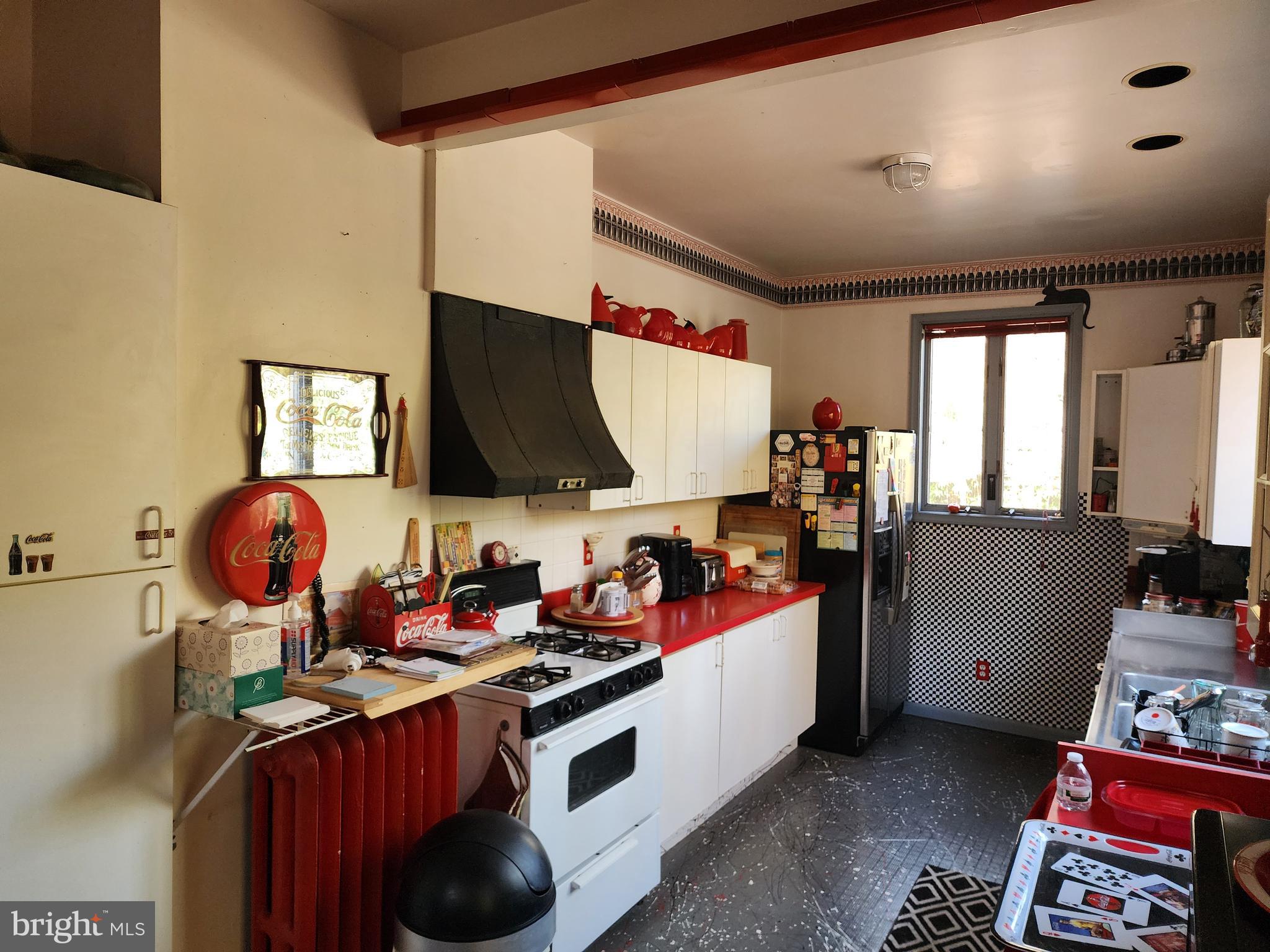 2307 Cooper Road Atco, NJ 08004 - Photo 15 of 47 a room with furniture a flat screen tv and a window