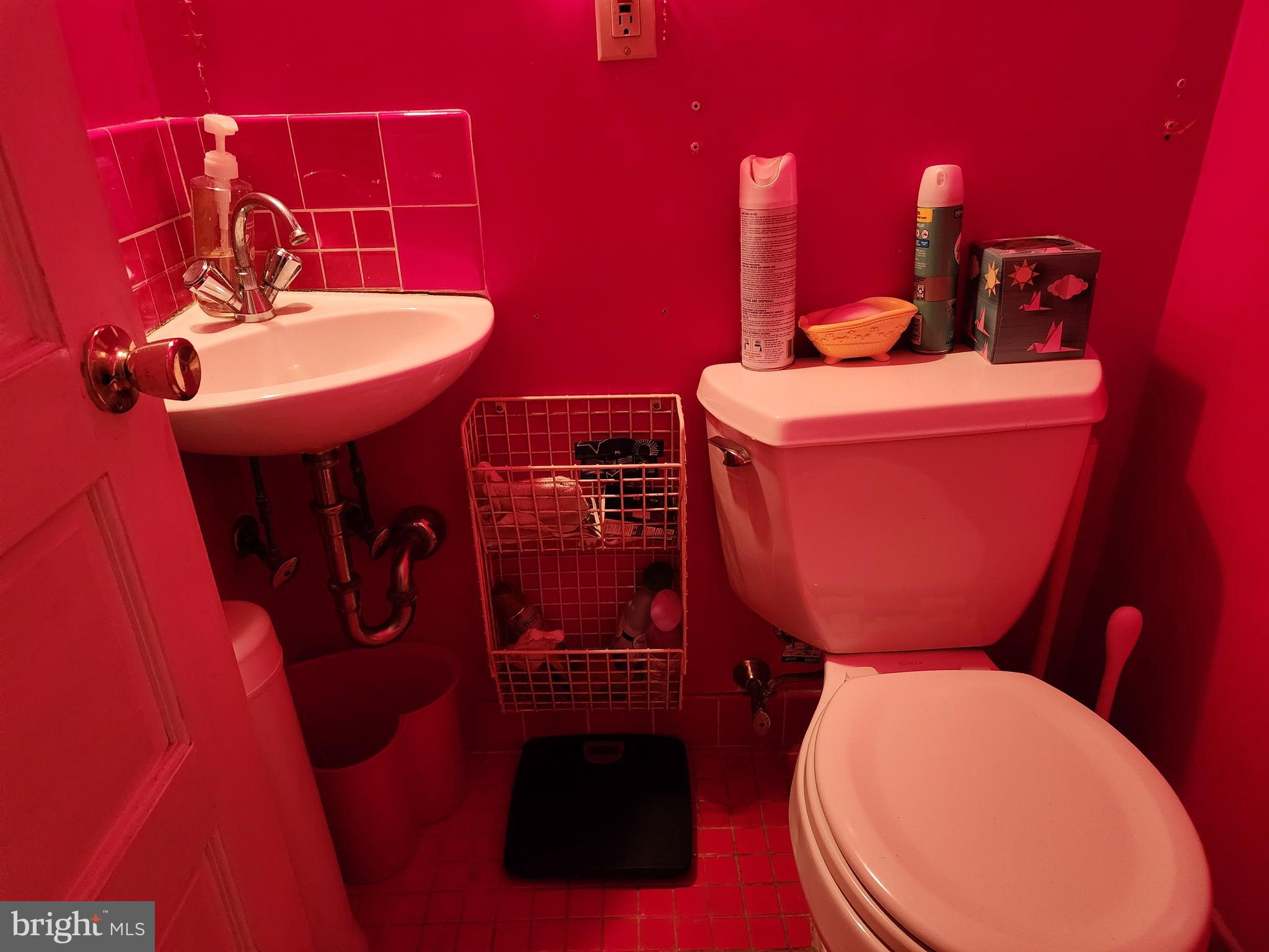 2307 Cooper Road Atco, NJ 08004 - Photo 25 of 47 a bathroom with a toilet a sink and mirror