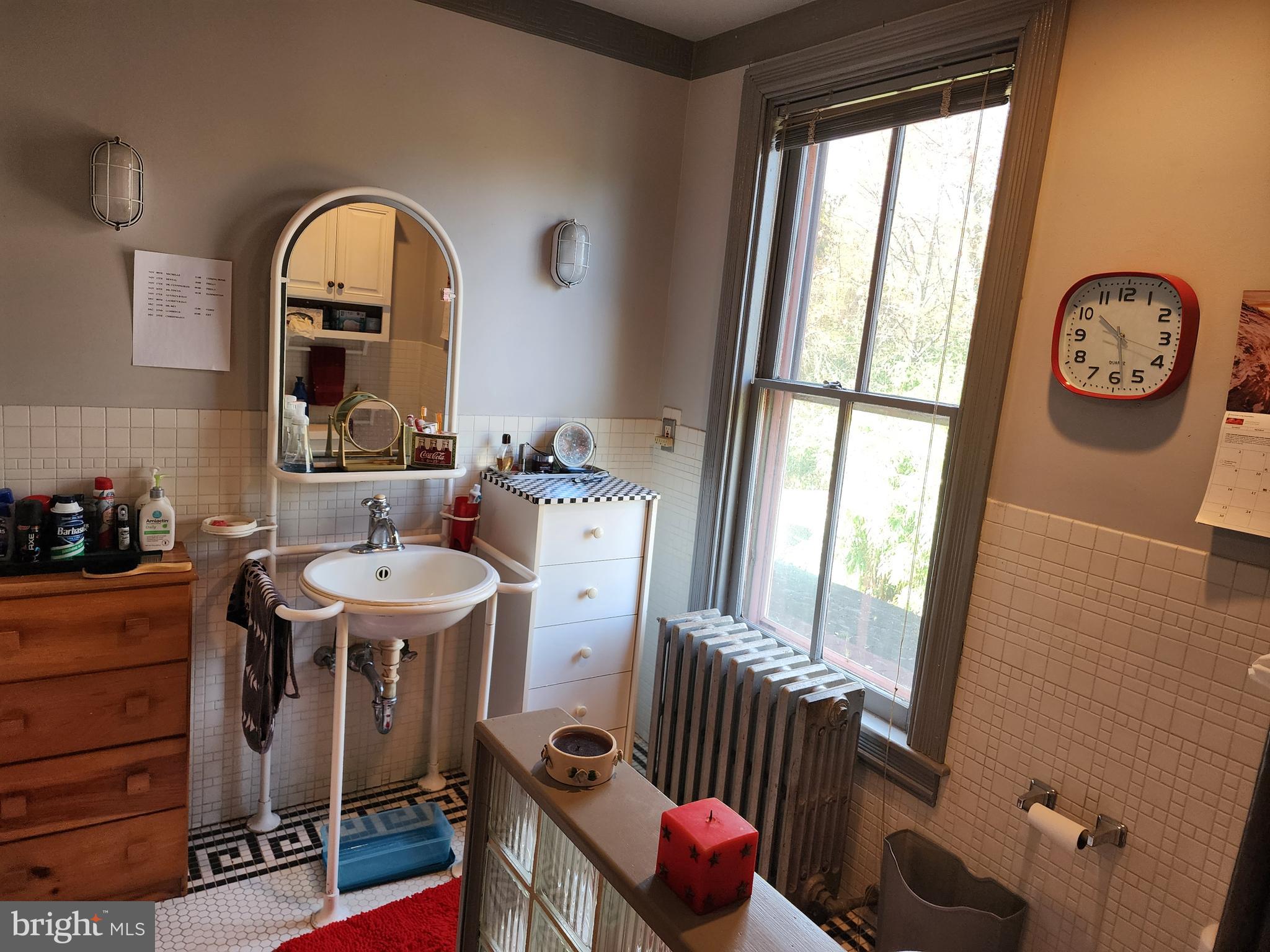 2307 Cooper Road Atco, NJ 08004 - Photo 32 of 47 a view of a room that has a couch and a table in it