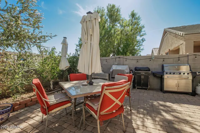 a view of a chairs and table in the terrace
