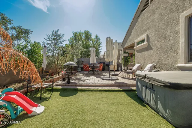 a view of swimming pool with outdoor seating