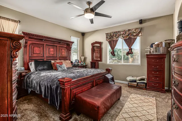 a bed room with a bed and a dresser