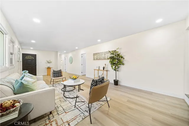 a living room with furniture and a couch