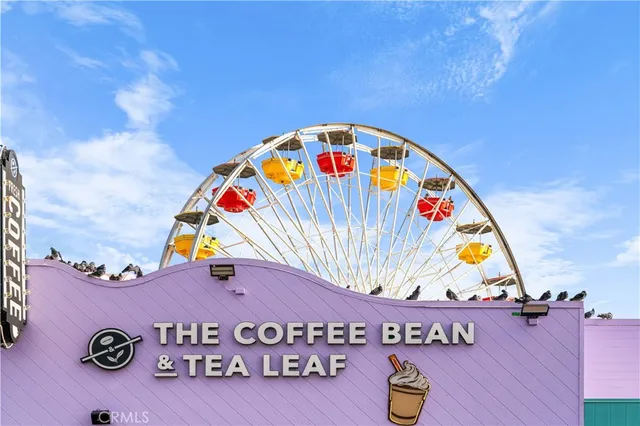 a view of a balcony with wooden floor