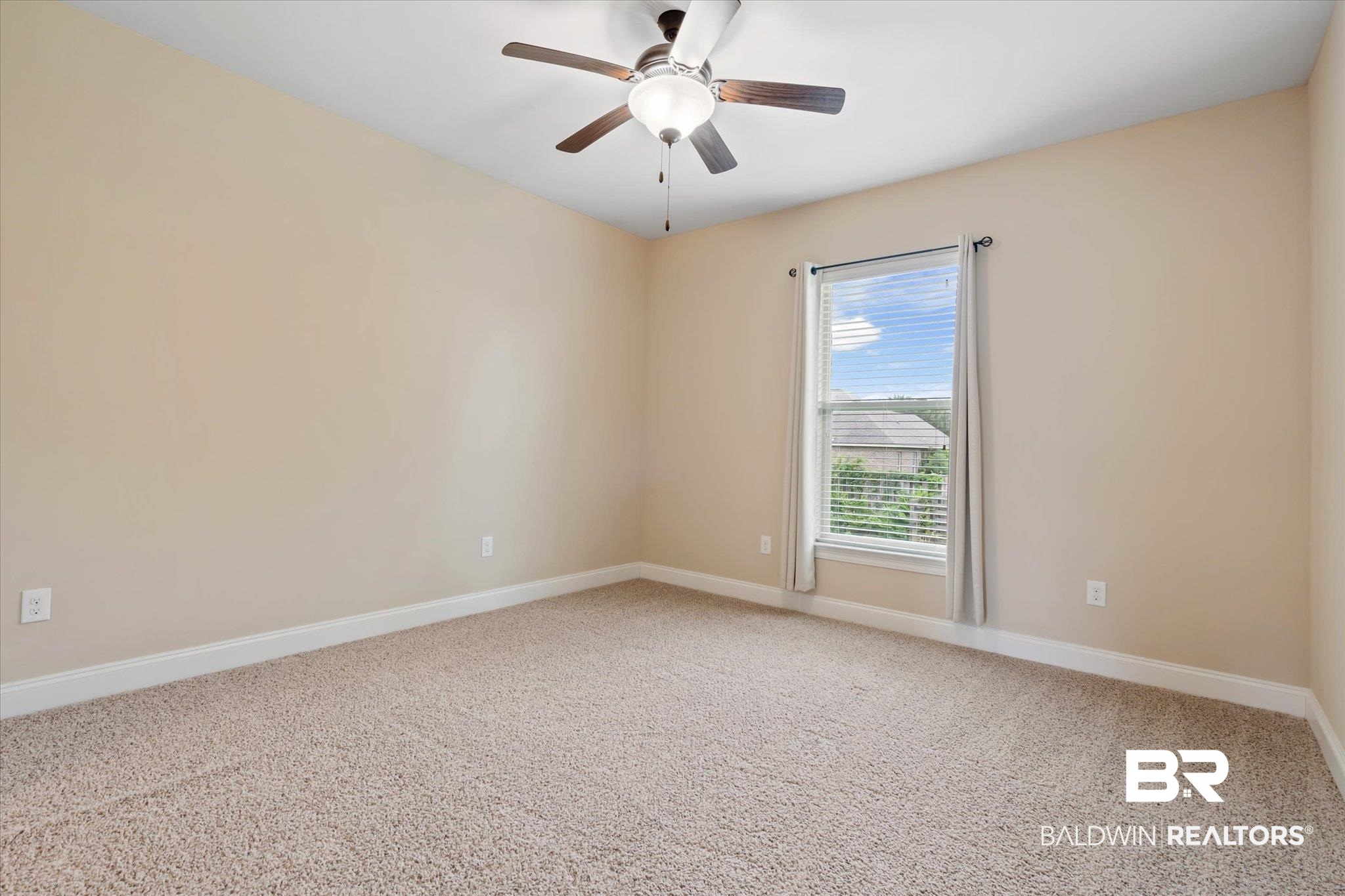 423 Breckin Drive Fairhope, AL 36532 - Photo 21 of 31 Spare room with ceiling fan and carpet floors
