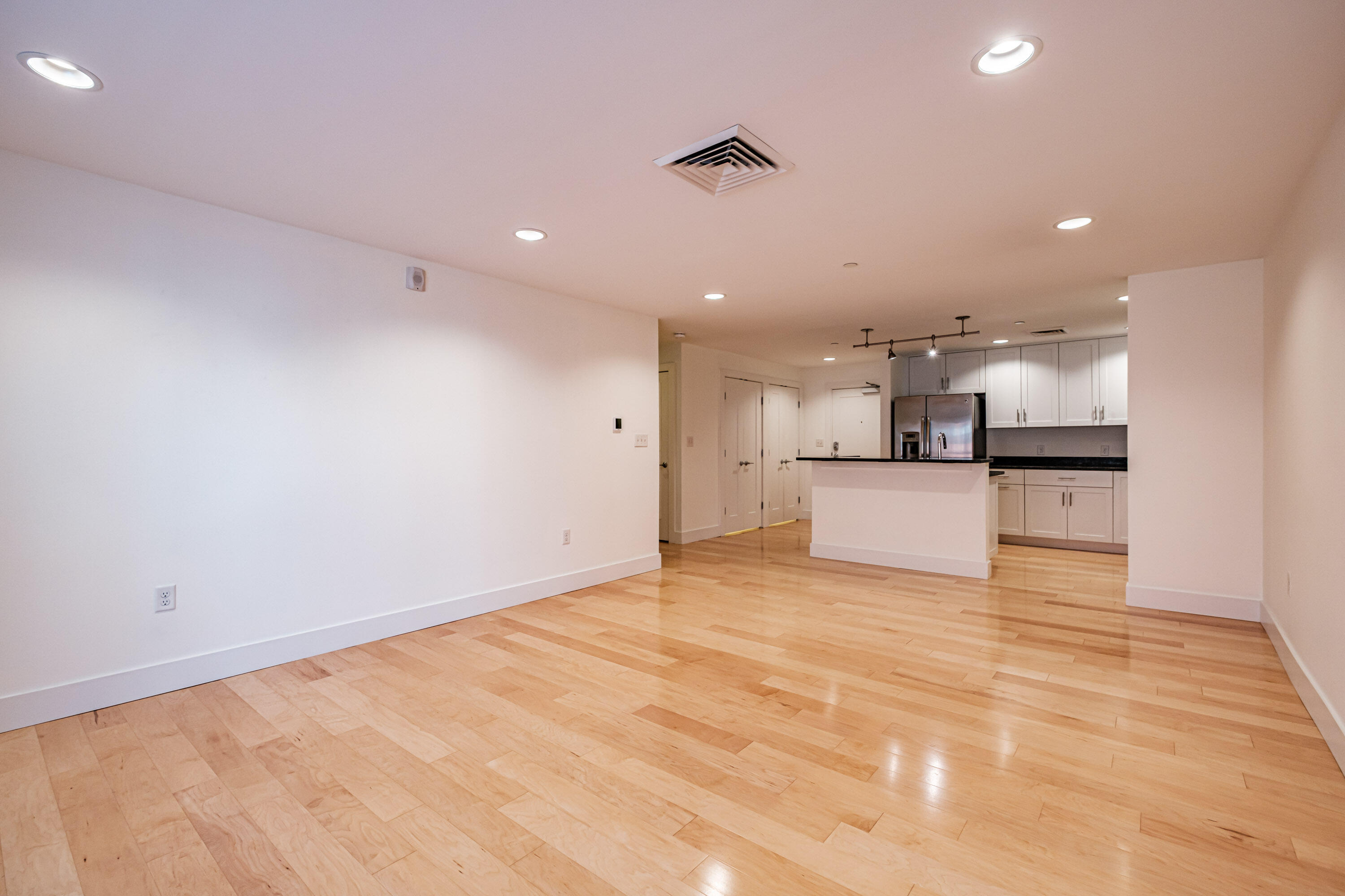 25 High Street, Unit 214 Portland, ME 04101 - Photo 23 of 54 Living to Kitchen