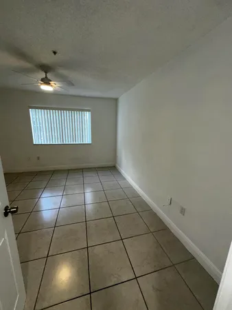 a bathroom with a shower and a toilet