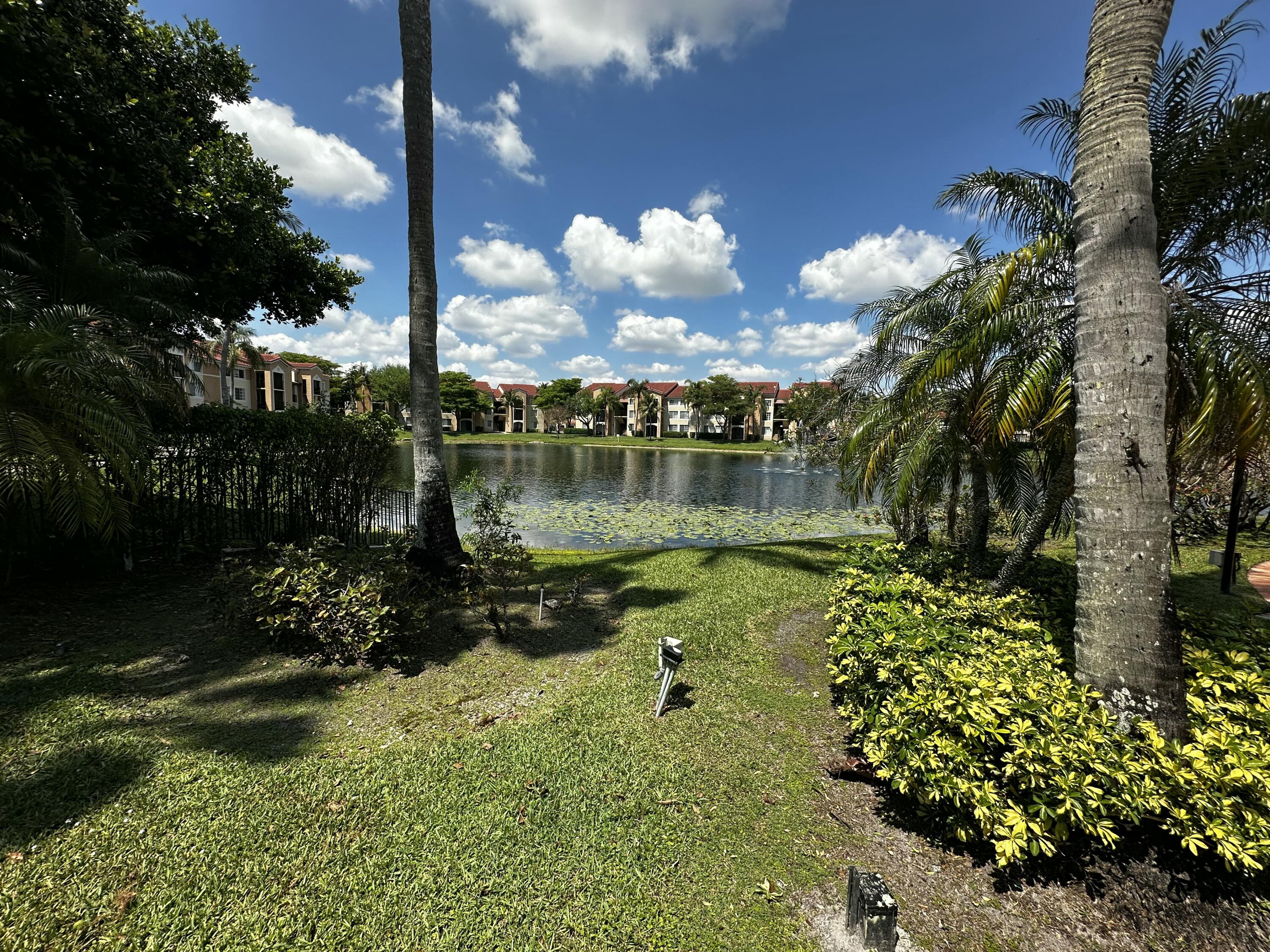 2103 Renaissance Boulevard, Unit 306 Miramar, FL 33025 - Photo 32 of 44 a view of a lake with a lake