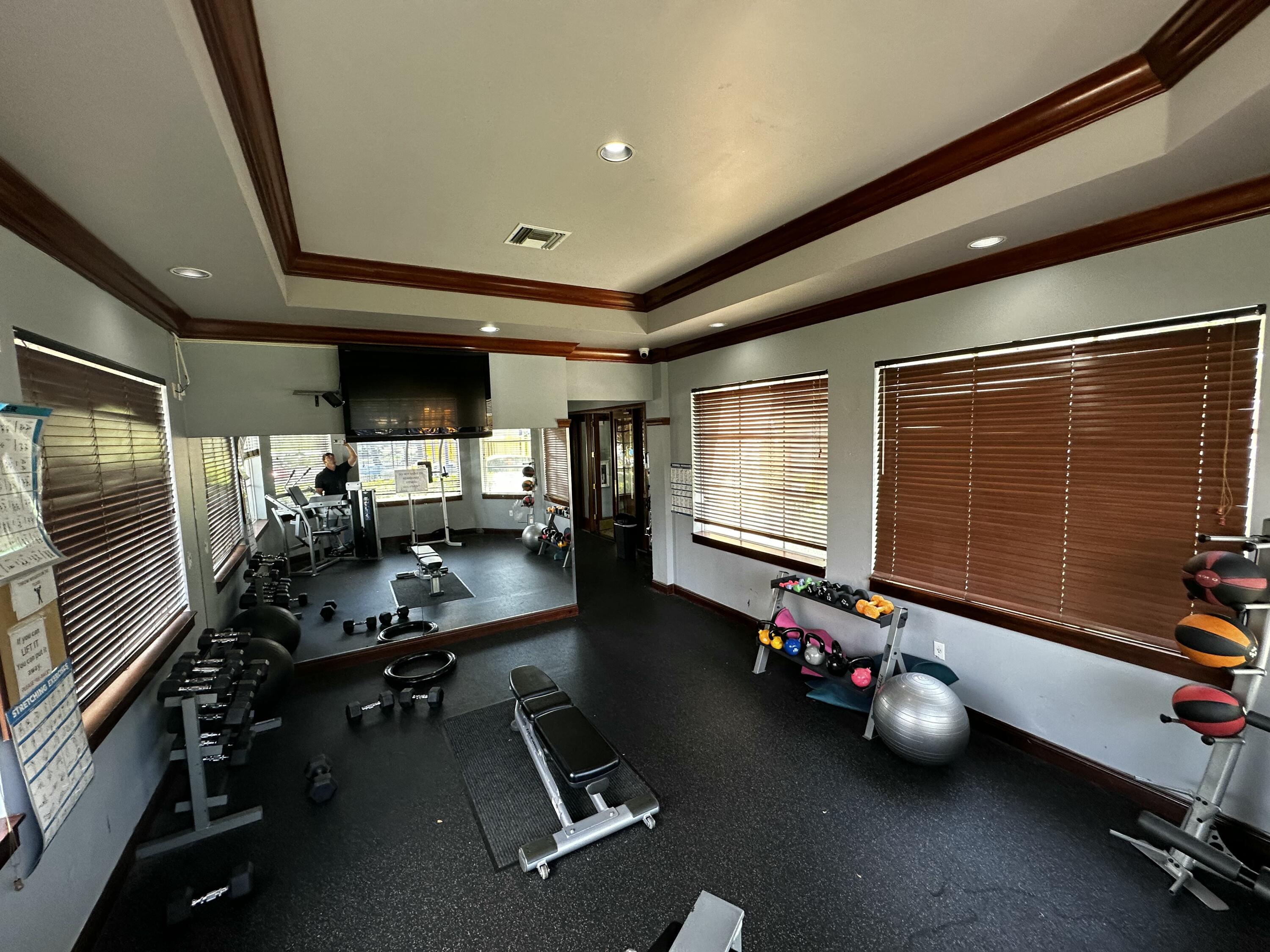 2103 Renaissance Boulevard, Unit 306 Miramar, FL 33025 - Photo 36 of 44 a room with gym equipment
