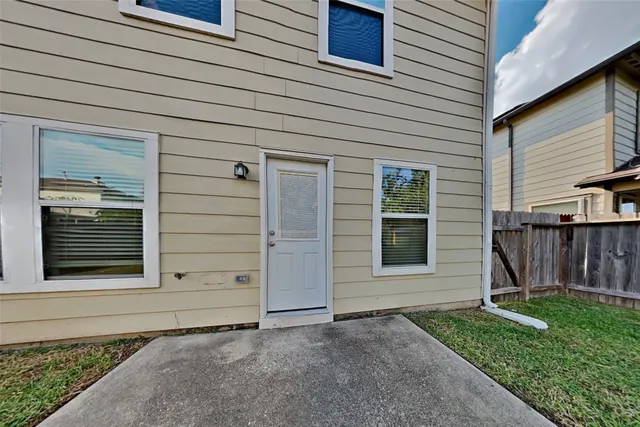 a front view of a house with a garage