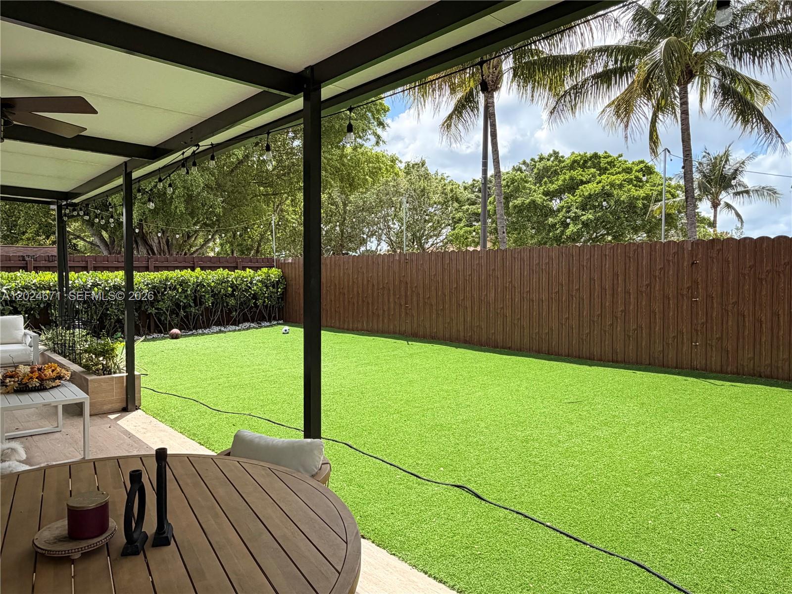 2116 Northeast 38th Road, Unit 2116 Homestead, FL 33033 - Photo 31 of 31 a view of outdoor space with seating