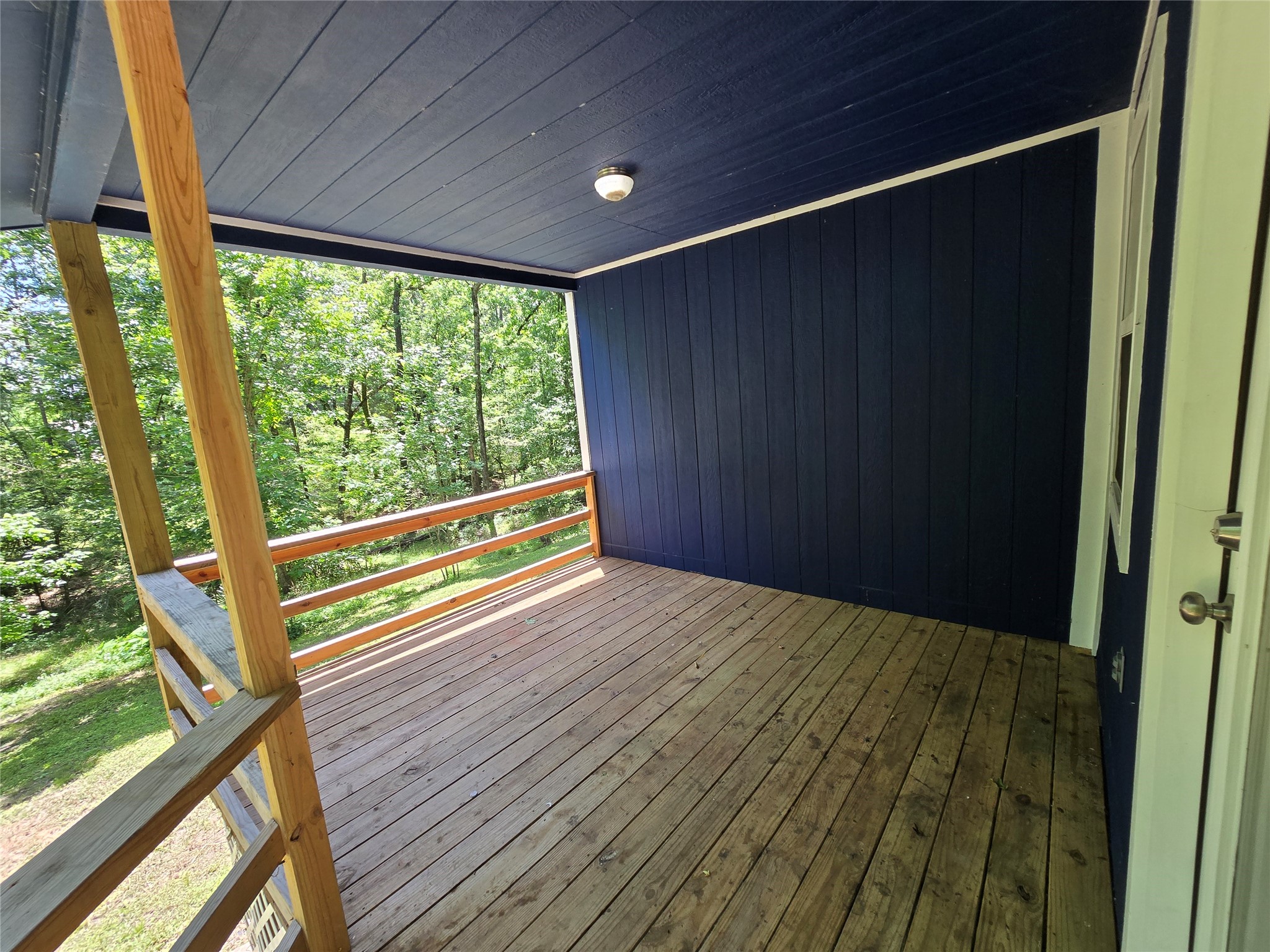 110 Hidden Circle Coldspring, TX 77331 - Photo 24 of 24 Deck area with a great view of the backyard