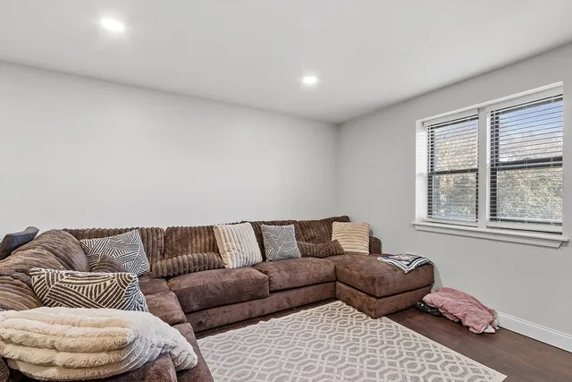 a living room with furniture and a couch