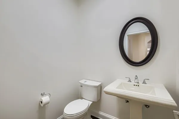 a bathroom with a sink and a toilet