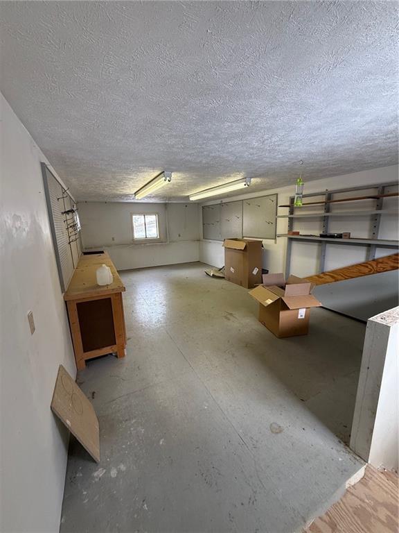 275 Old Scales Road Washington, PA 15301 - Photo 9 of 11 a view of a room with gym equipment and a window