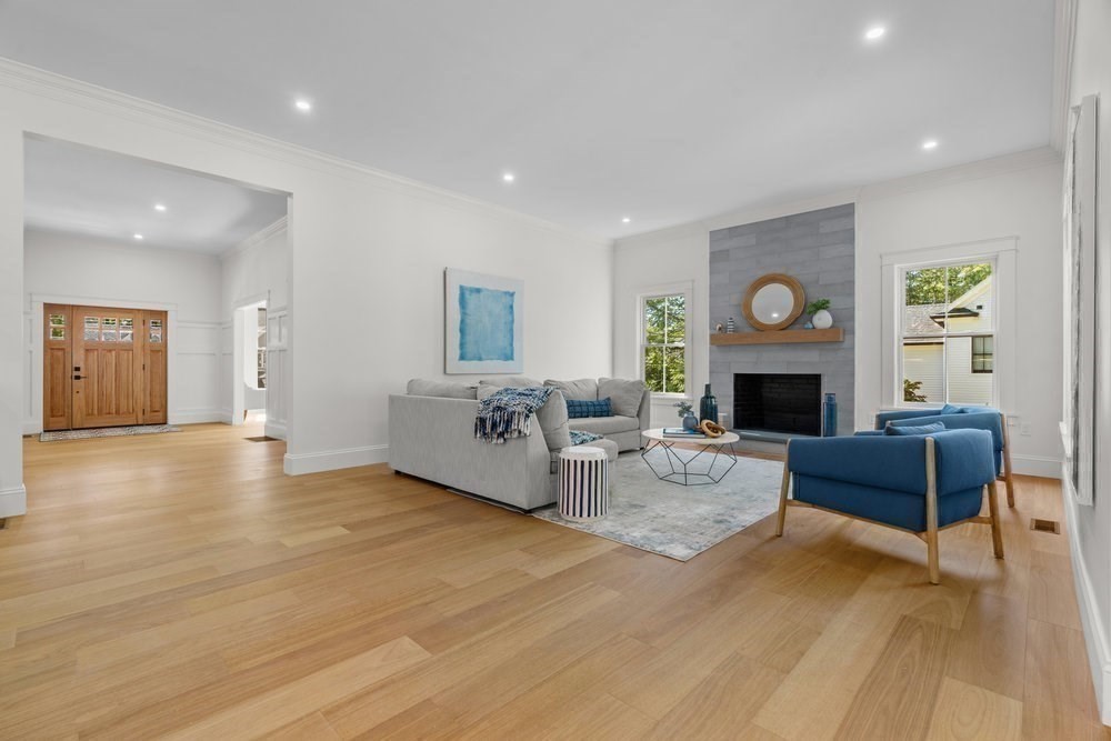 22 Tyler Road Lexington, MA 02420 - Photo 15 of 37 a living room with furniture and a fireplace