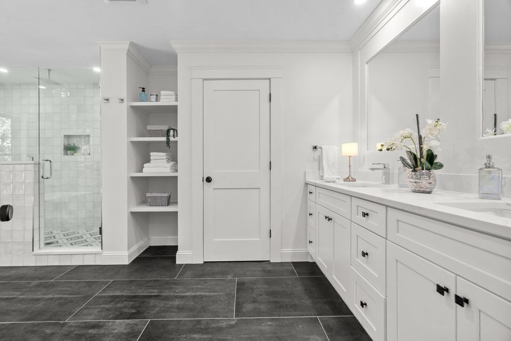 22 Tyler Road Lexington, MA 02420 - Photo 25 of 37 a bathroom with a shower and a sink