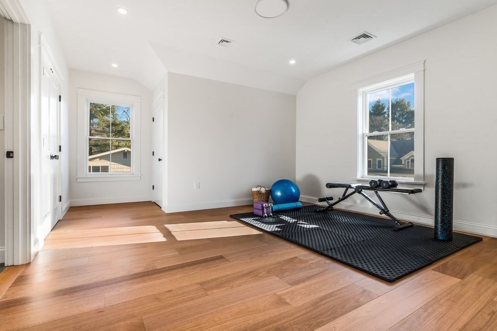 22 Tyler Road Lexington, MA 02420 - Photo 30 of 37 a living room with a couch and next to a window