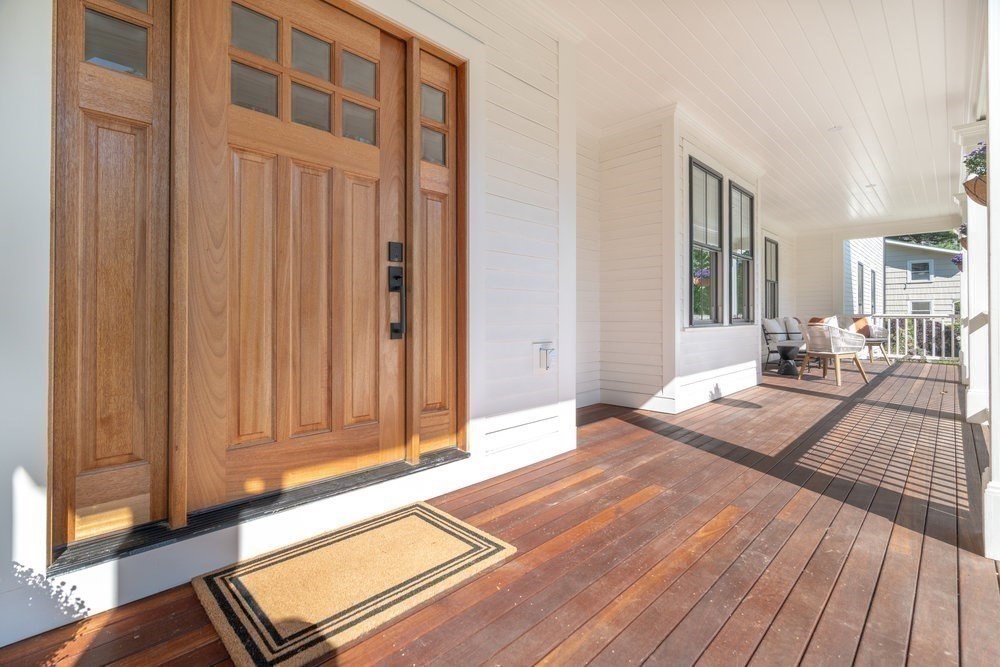 22 Tyler Road Lexington, MA 02420 - Photo 32 of 37 a view of a living room filled with furniture