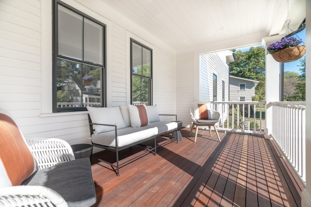 22 Tyler Road Lexington, MA 02420 - Photo 33 of 37 a living room with furniture and a large window