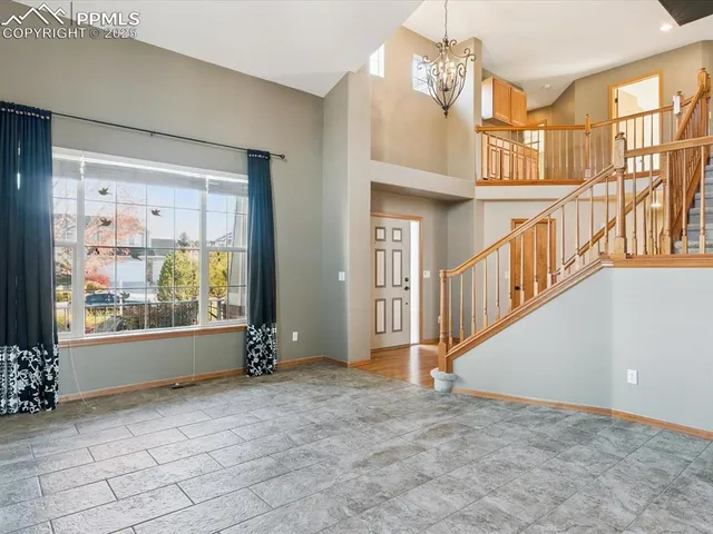 a view of an entryway with staircase