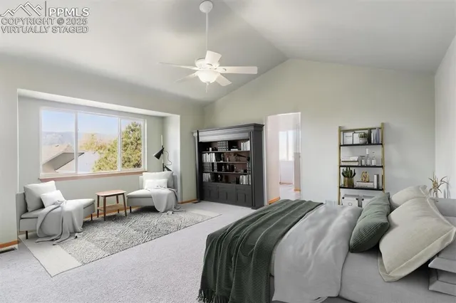 an empty room with windows and chandelier fan