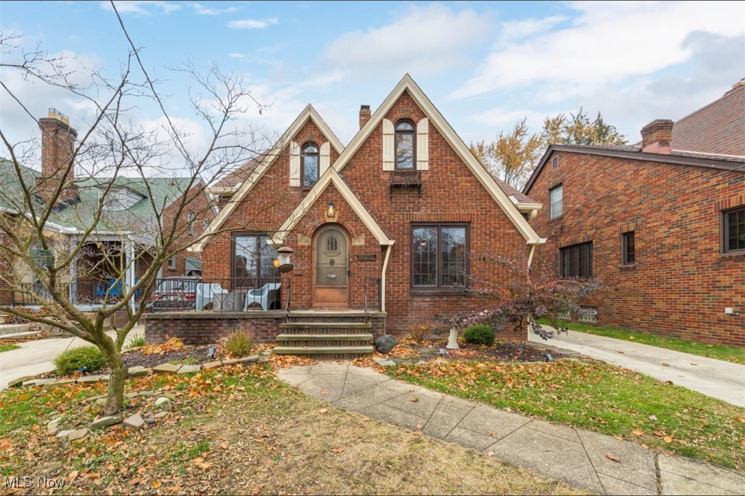 15500 Greenway Road Cleveland, OH 44111 - Photo 1 of 36 house featuring brick siding and a chimney