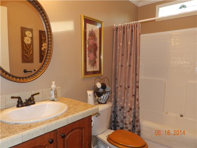 2407 Sylvia Road Dickson, TN 37055 - Photo 10 of 19 Hall Full Bath. Check out window above for natural light. No detail was left out of this home.