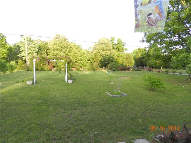 2407 Sylvia Road Dickson, TN 37055 - Photo 16 of 19 Front Yard. Well taken care of with lots of trees and plants.