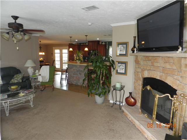 2407 Sylvia Road Dickson, TN 37055 - Photo 18 of 19 Open Floor Plan. Great for Entertaining. Wood Burning Fireplace.