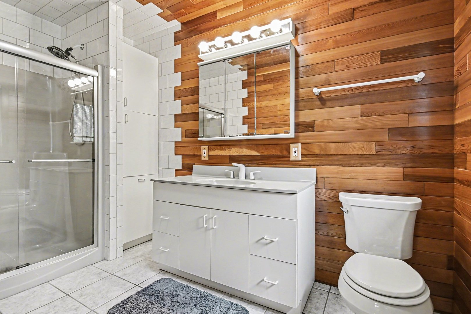 14340 West Bruce Road Homer Glen, IL 60491 - Photo 18 of 38 a bathroom with a toilet a sink and shower