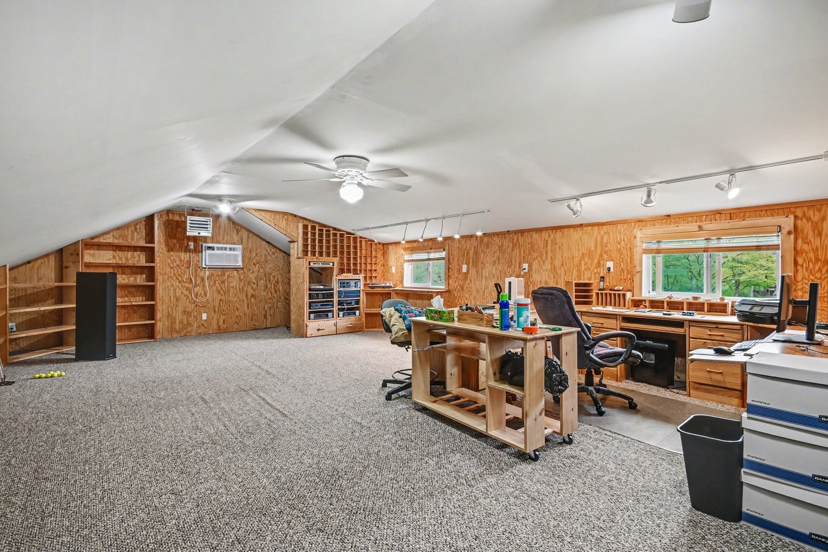 14340 West Bruce Road Homer Glen, IL 60491 - Photo 34 of 38 a view of a livingroom with furniture and a ceiling fan