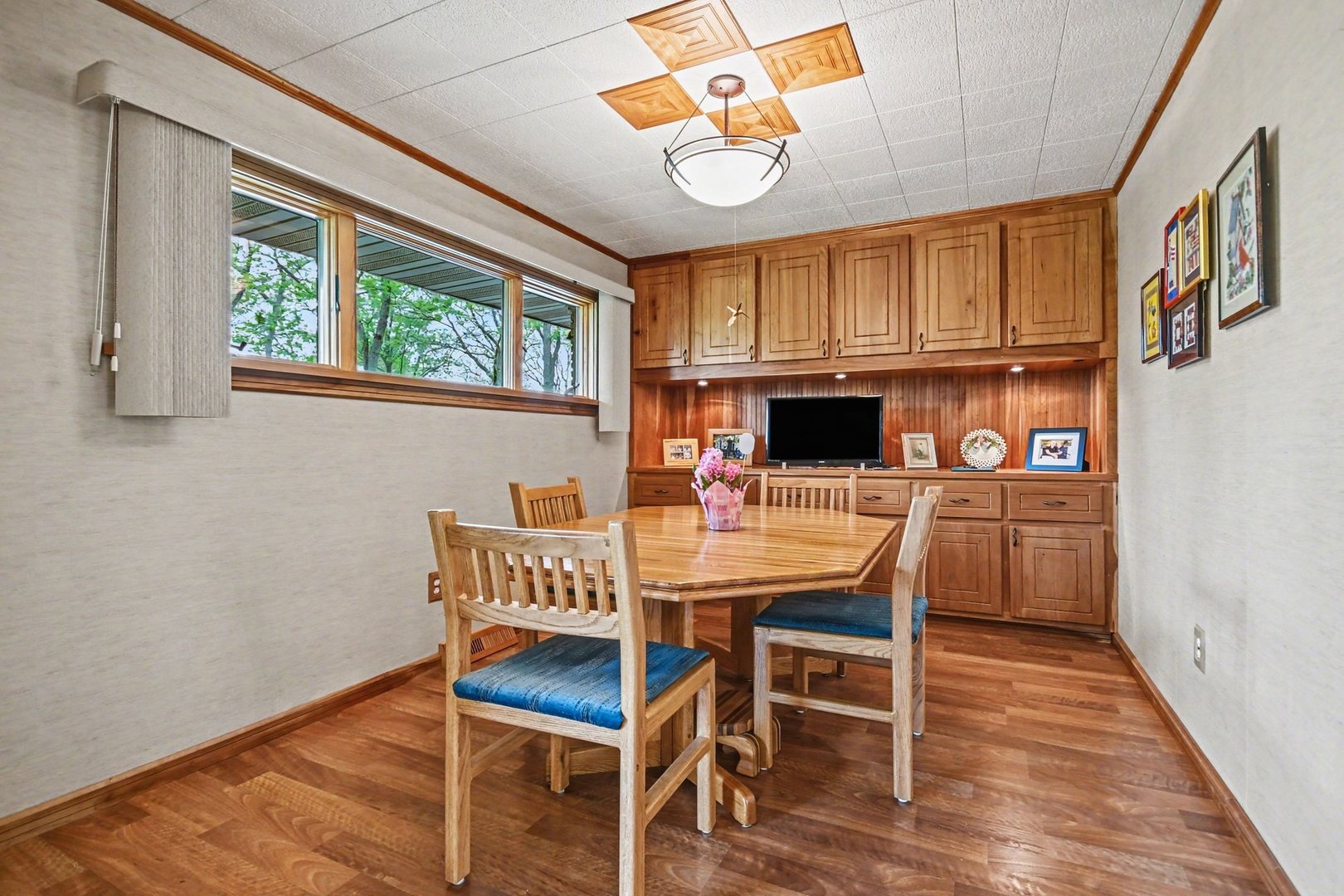 14340 West Bruce Road Homer Glen, IL 60491 - Photo 10 of 38 a view of a dining room with furniture window and wooden floor