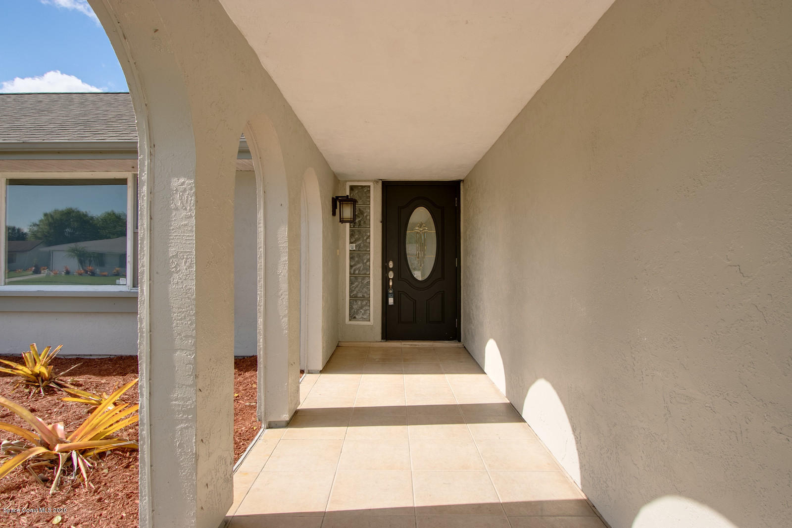 1058 Cromey Road Northeast Palm Bay, FL 32905 - Photo 3 of 29 Front porch