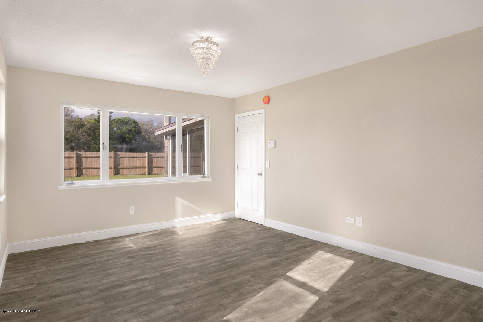1058 Cromey Road Northeast Palm Bay, FL 32905 - Photo 7 of 29 Master Bedroom