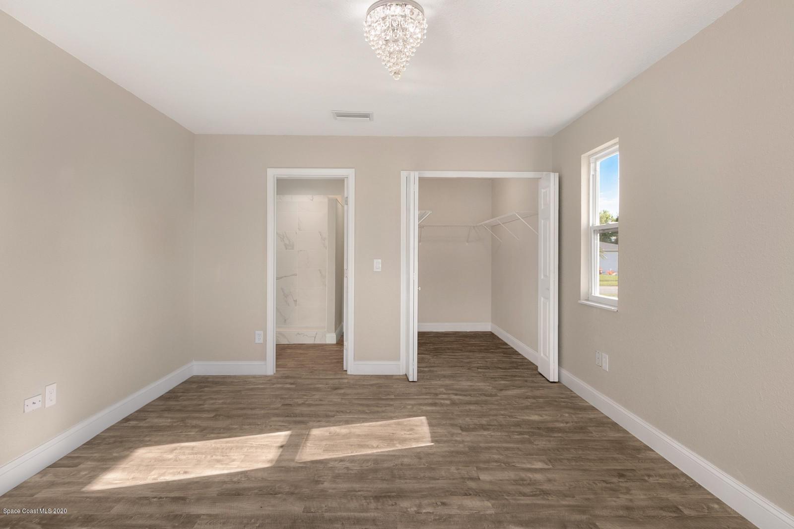 1058 Cromey Road Northeast Palm Bay, FL 32905 - Photo 8 of 29 Master Bedroom