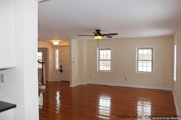 141 Berea Road Walden, NY 12586 - Photo 10 of 23 a view of an empty room with window and wooden floor