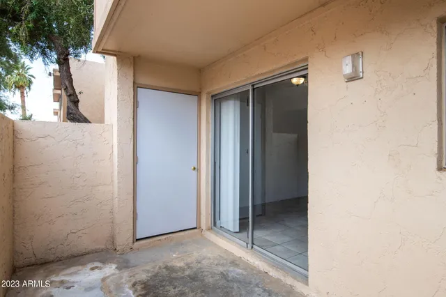 a front view of a house with parking