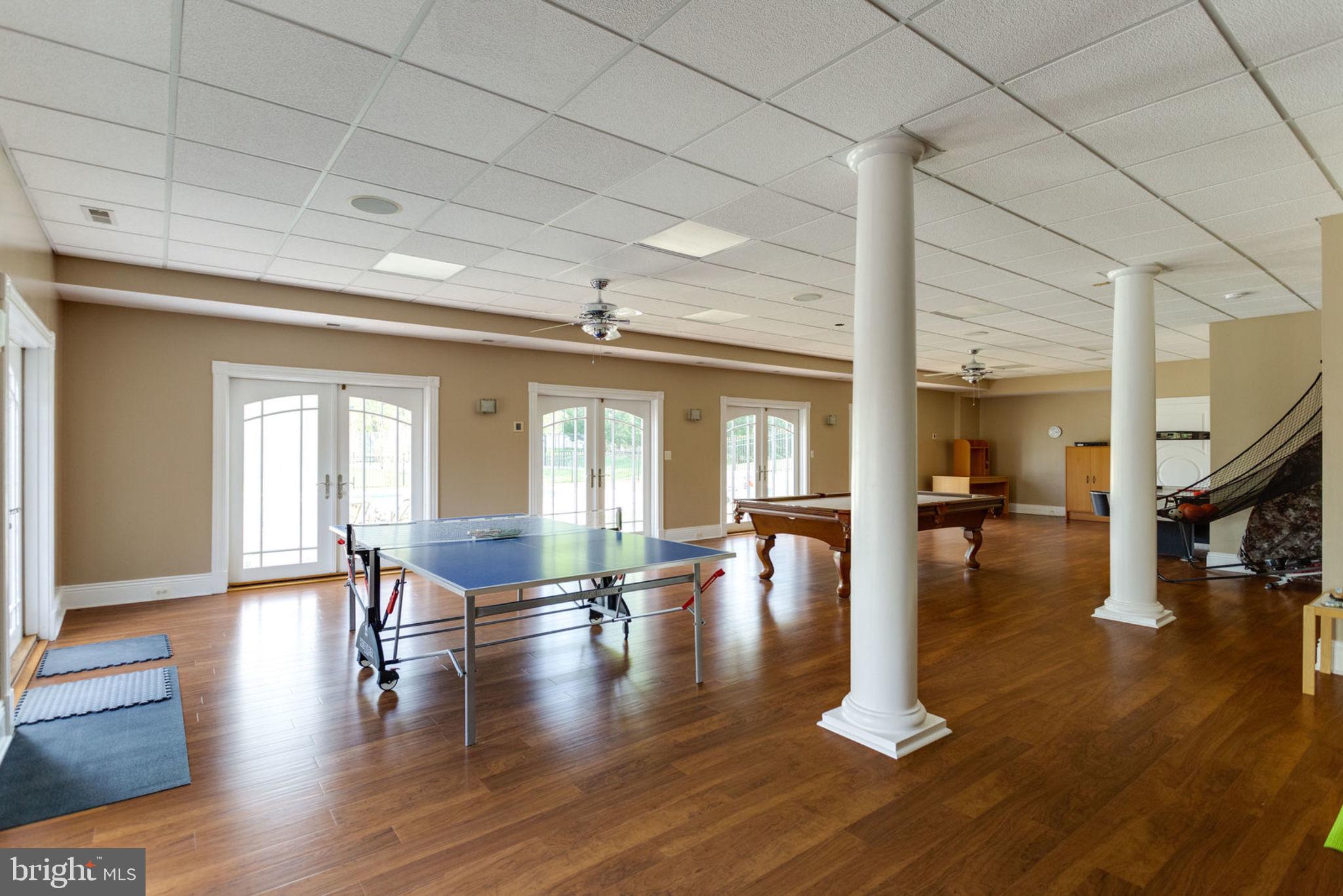 12821 Travilah Road Potomac, MD 20854 - Photo 36 of 59 Expansive Game Room and Entertainment area