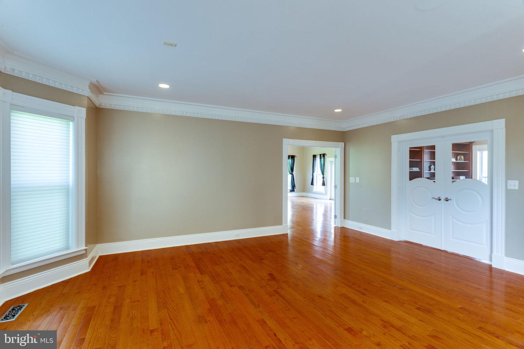 12821 Travilah Road Potomac, MD 20854 - Photo 9 of 59 Formal Living with entrance to office or sunroom