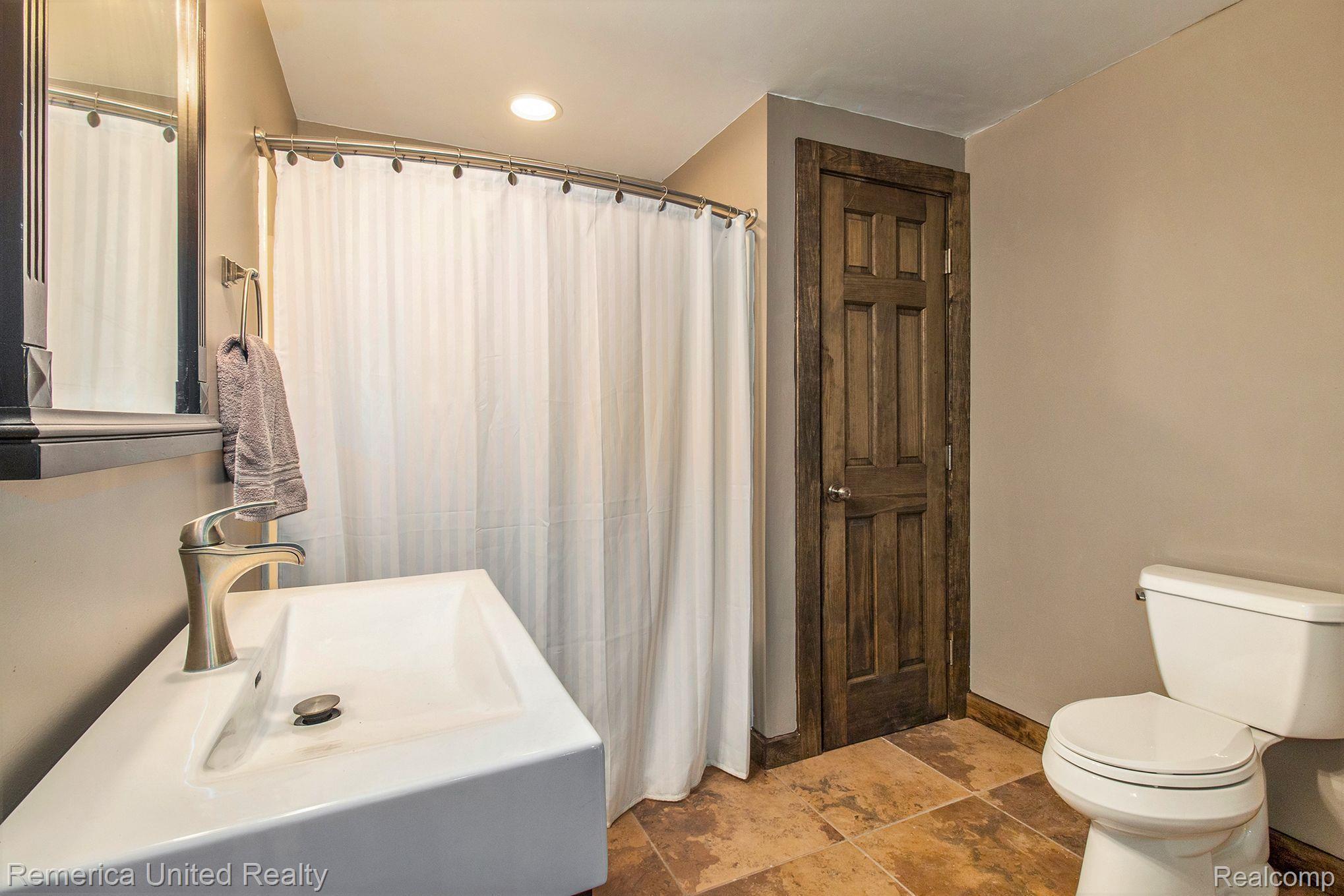 3470 East Highland Road Howell, MI 48843 - Photo 56 of 66 Lower Level Bath