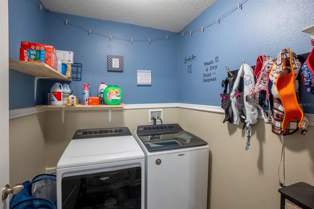 15 Grand Par Court Bunnell, FL 32110 - Photo 14 of 61 a room with storage and utility